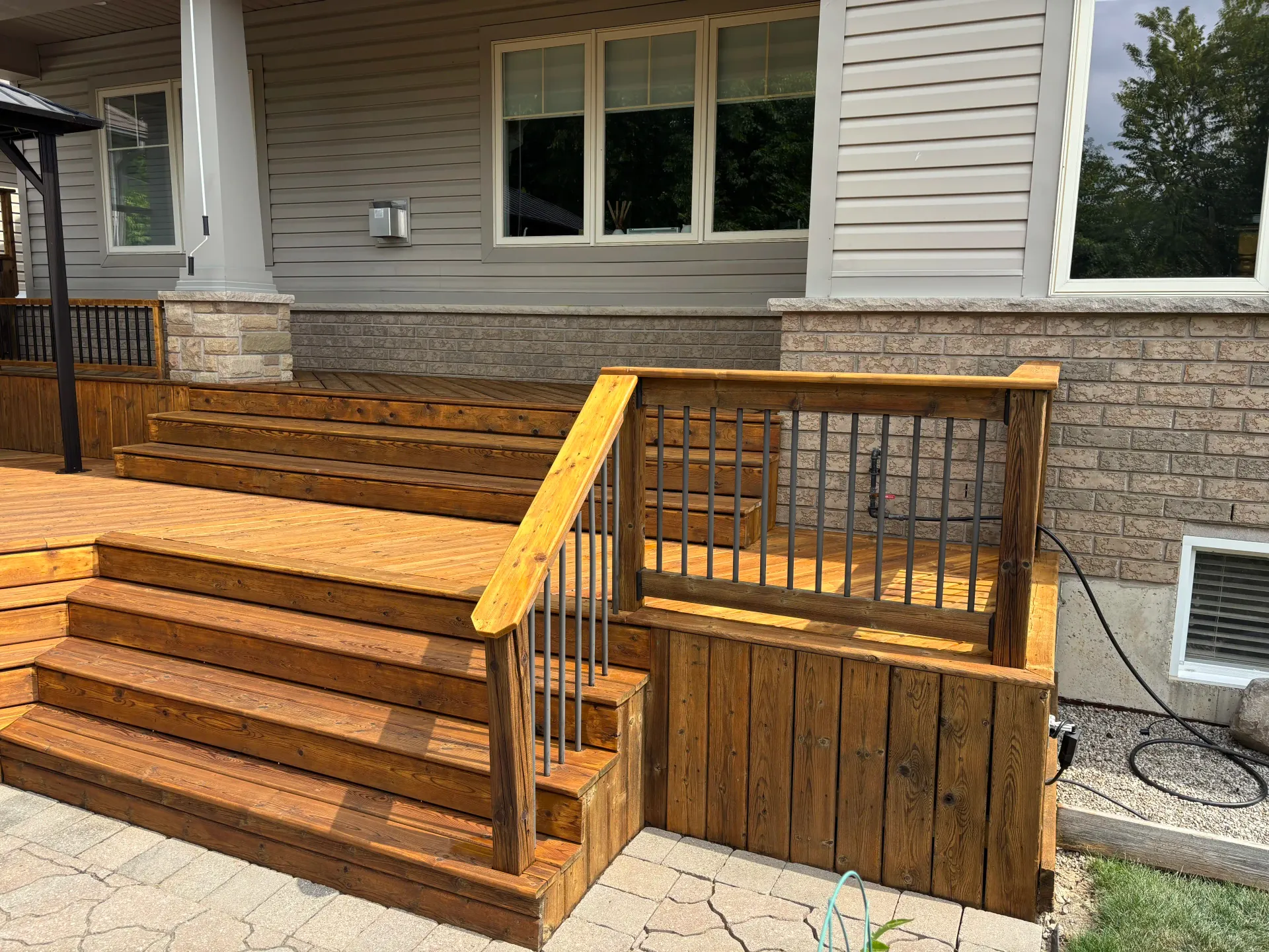 Deck Staining in Smithville — finished multi-level deck with pergola