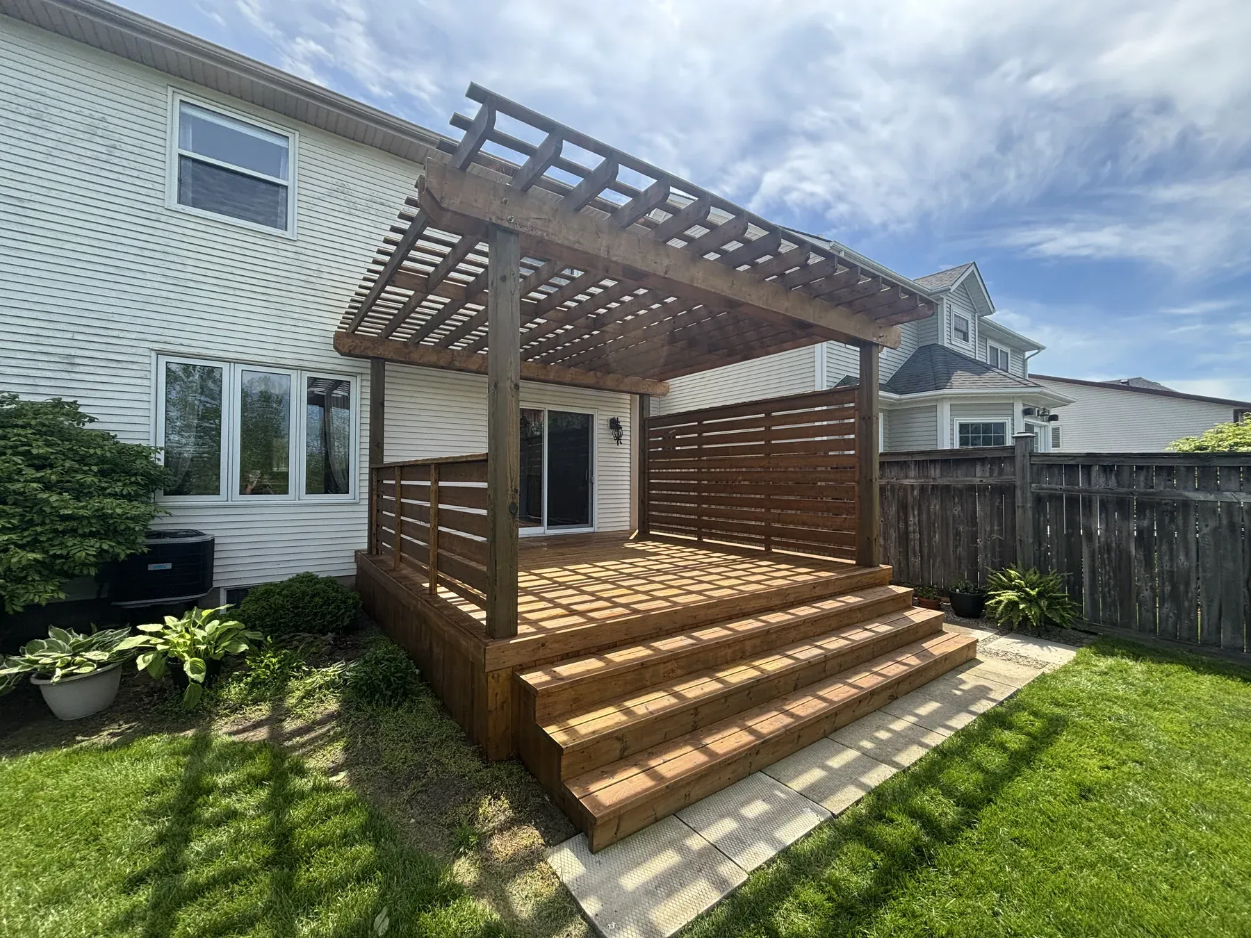 Deck Staining in Niagara-on-the-Lake — first stain on a new deck and pergola, Woodluxe Natural