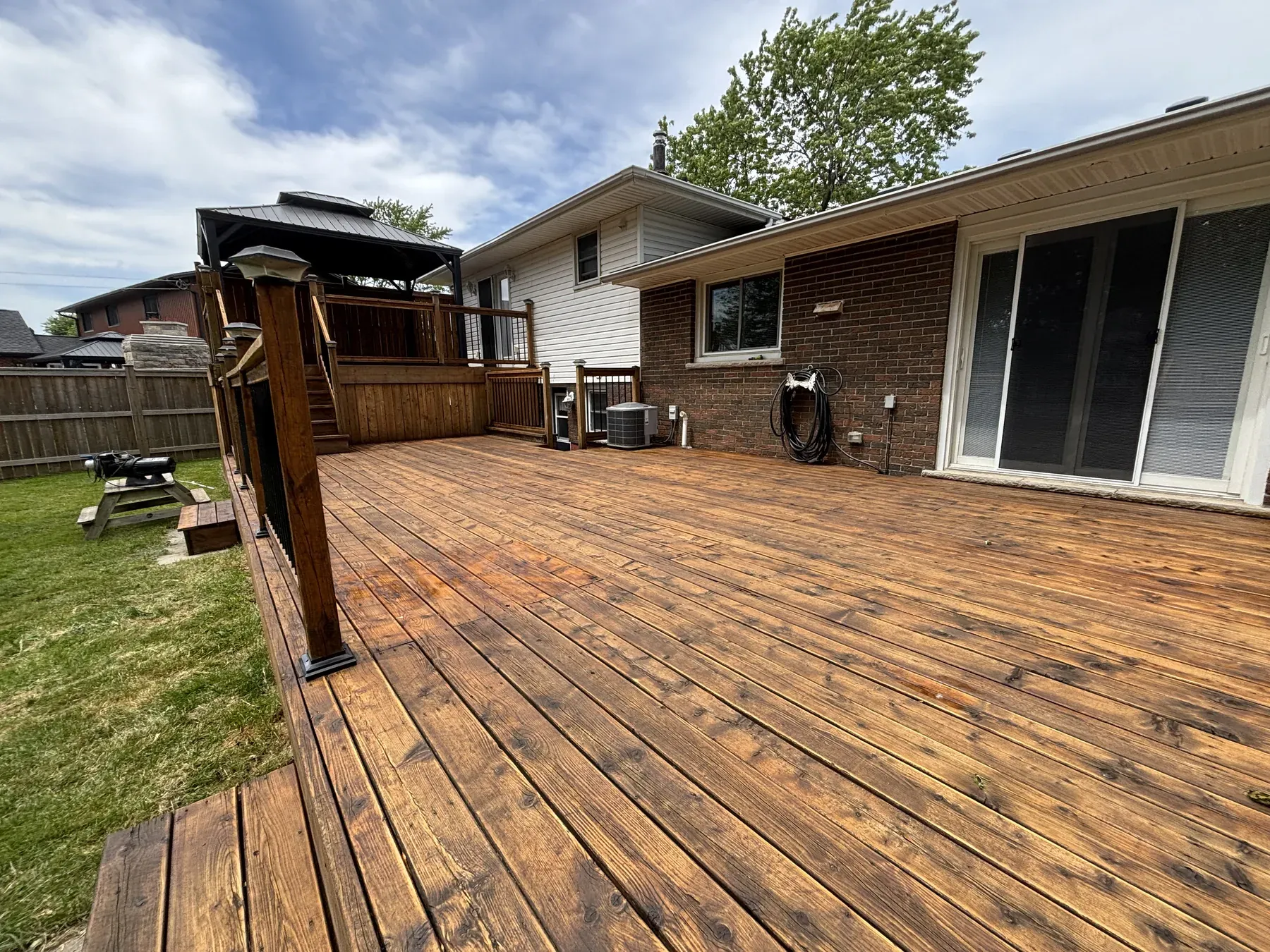 Maintenance Coat in Fort Erie — finished deck, Benjamin Moore Woodluxe Natural oil